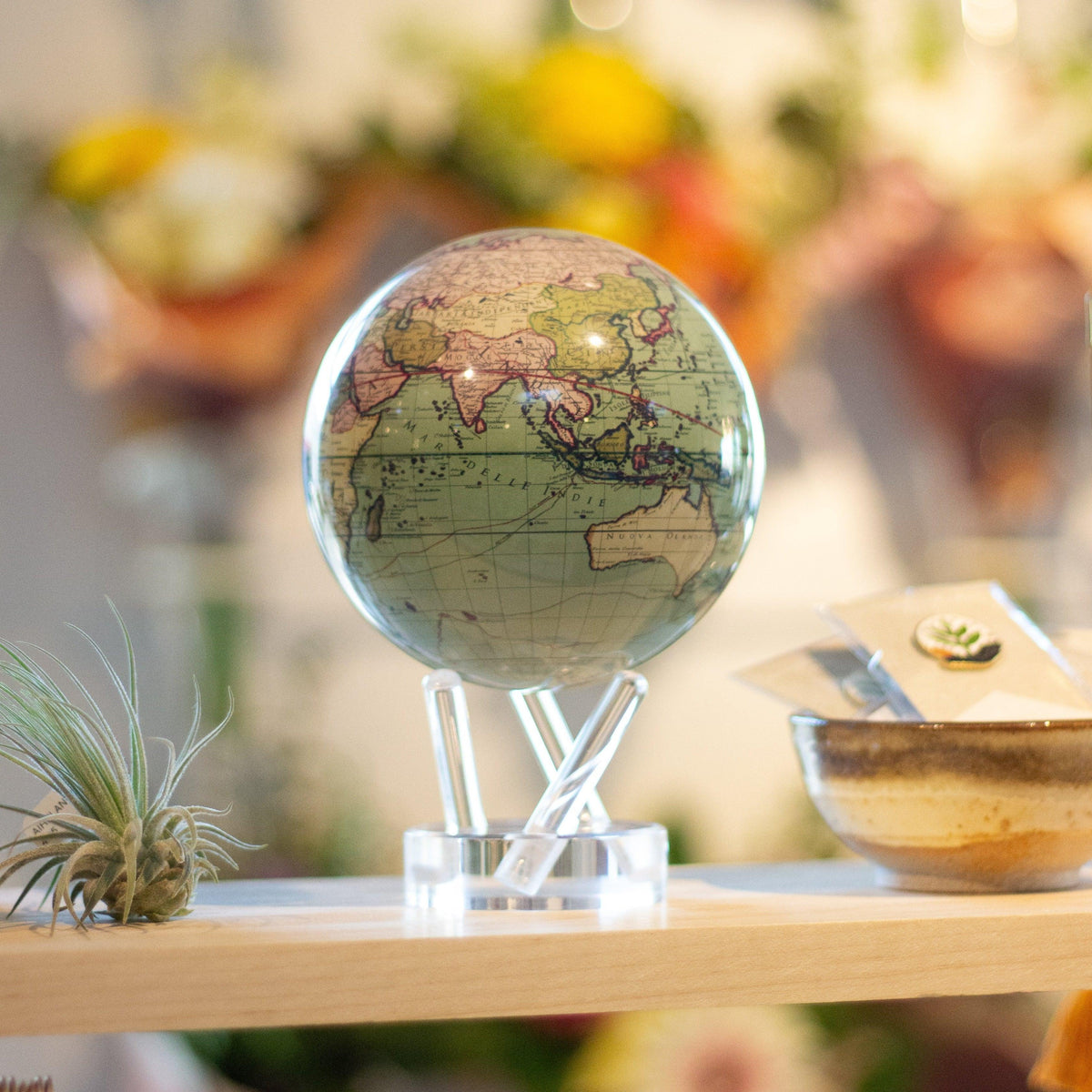 Antique map MOVA Globe in a bright sunlit interior