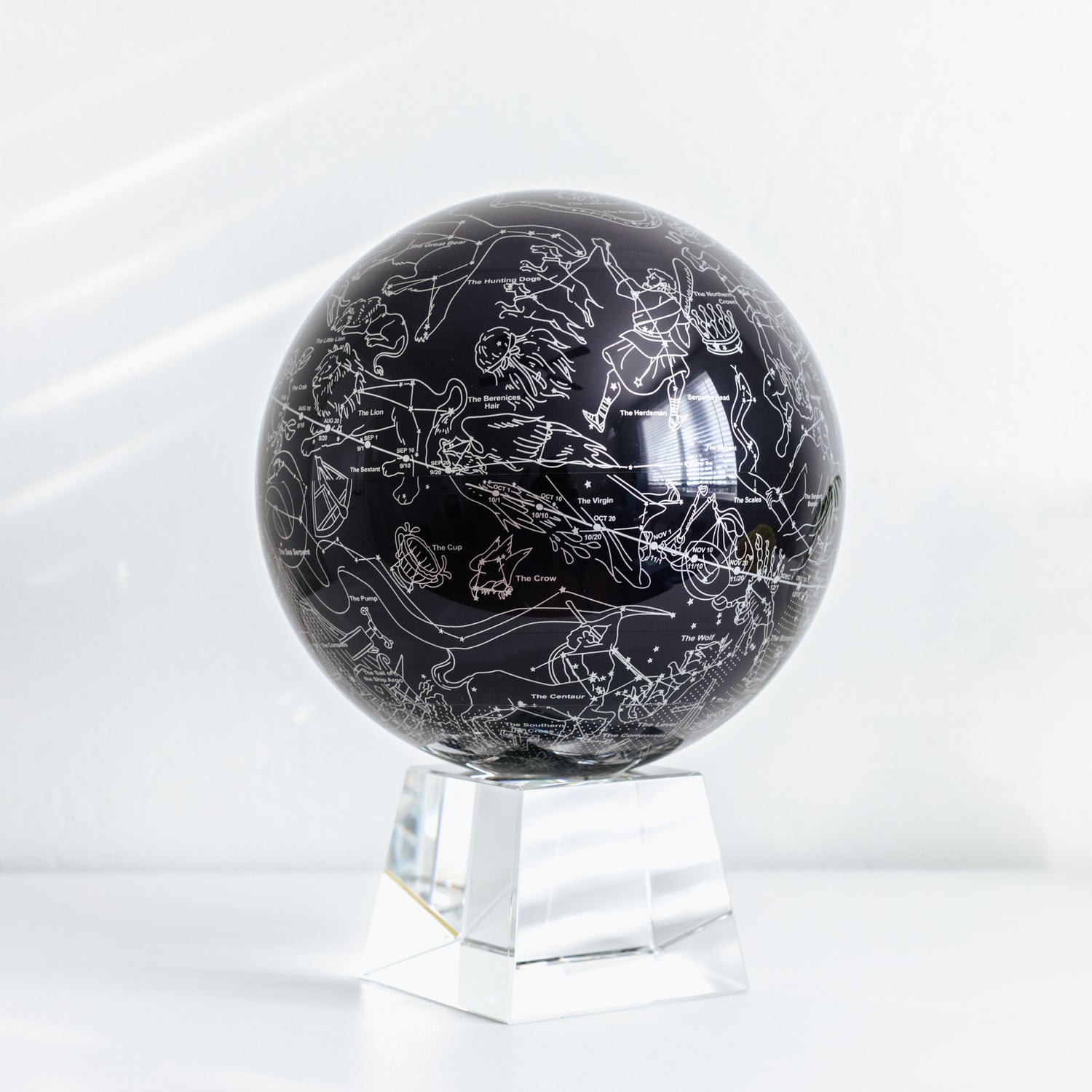 CONSTELLATIONS MOVA Globe, sleek astronomy-inspired décor showing 88 constellations in silver detail.
