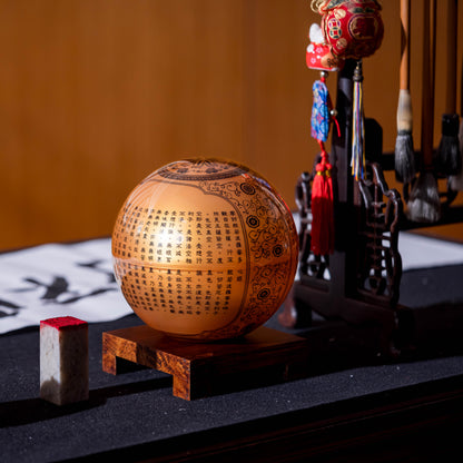 HEART SUTRA GOLD GLOBE on wooden stand, perfect meditative gift for collectors, art lovers, and feng shui inspired décor.