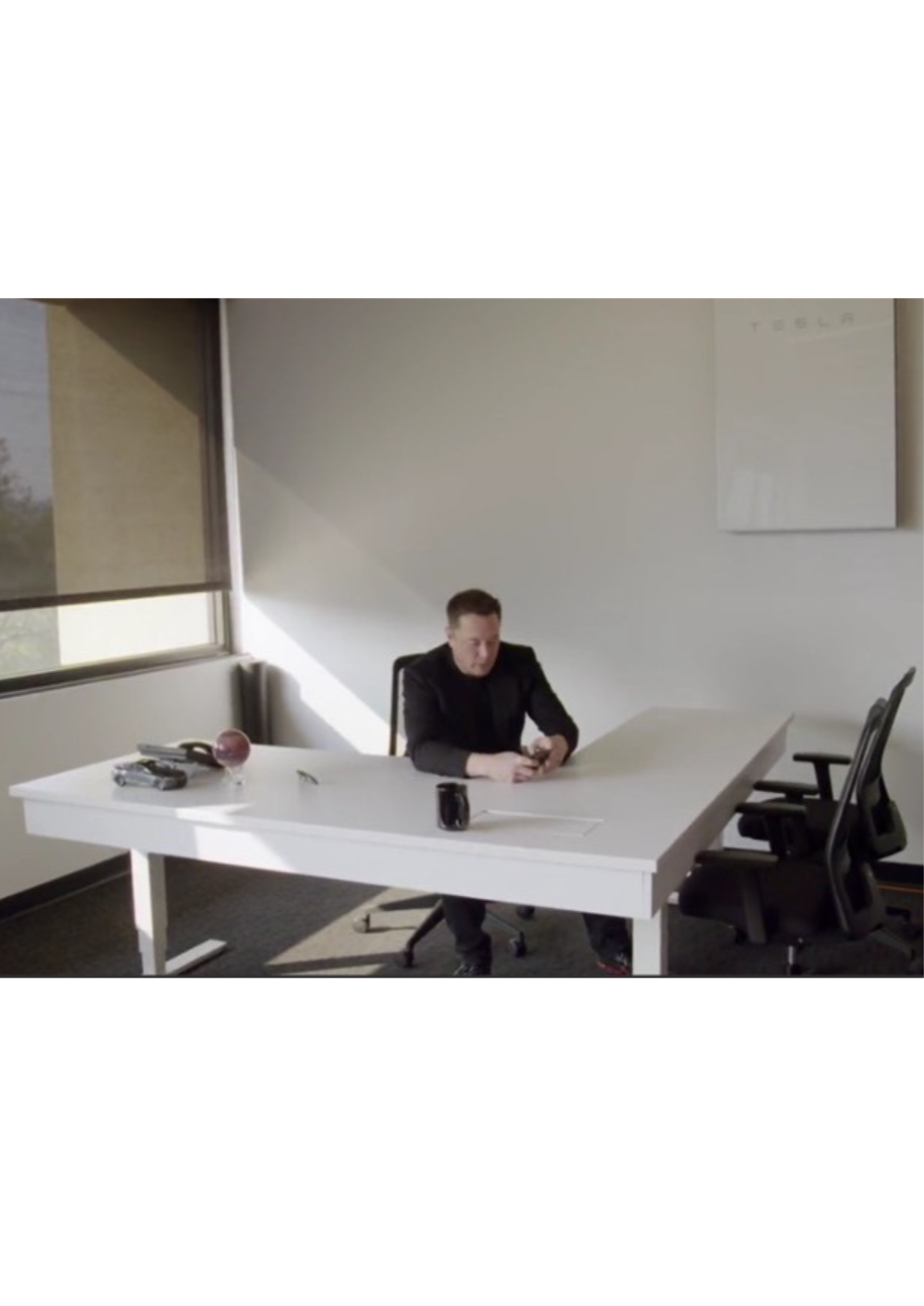 Elon Musk with Mars Globe