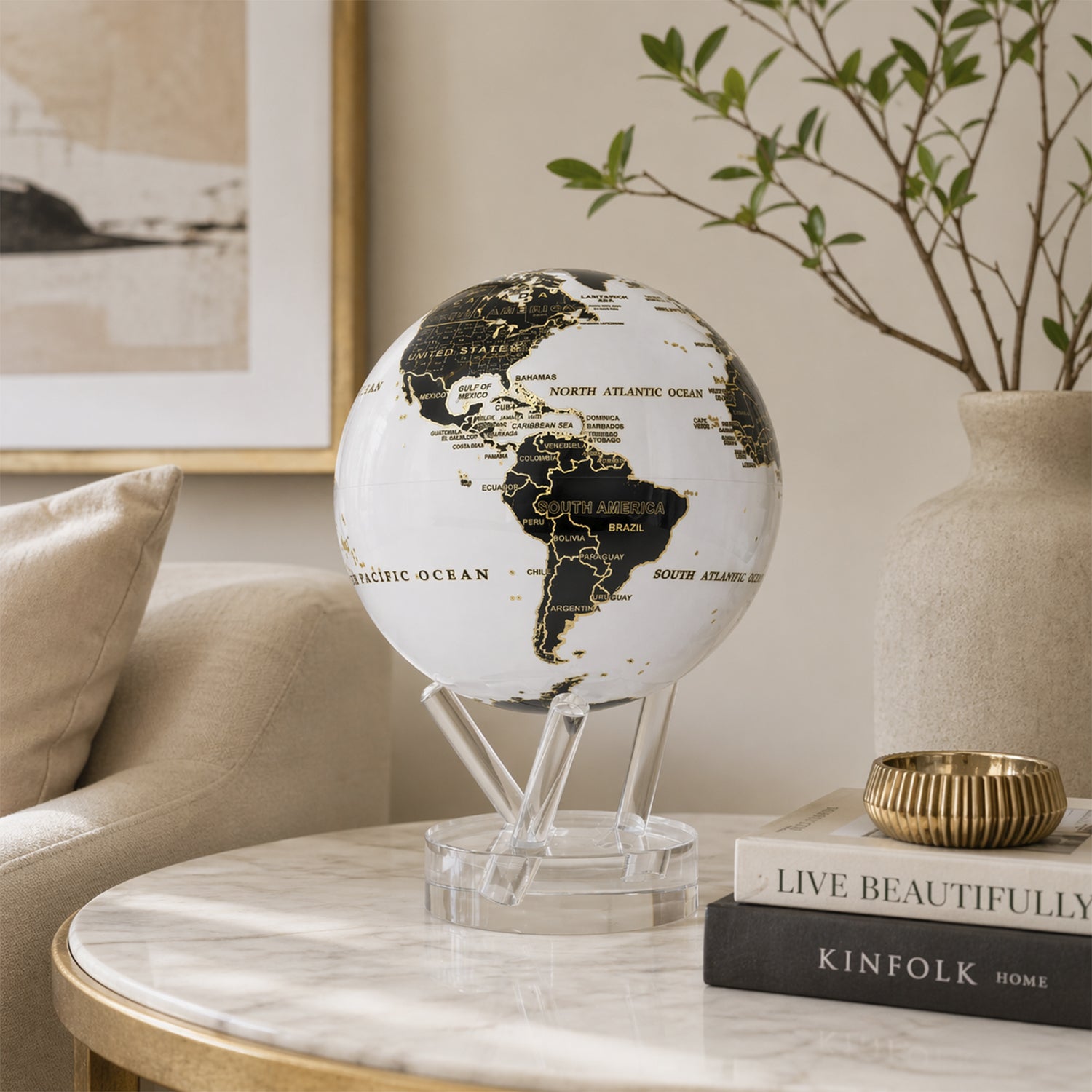 Decorative MOVA Globe displayed on a marble side table