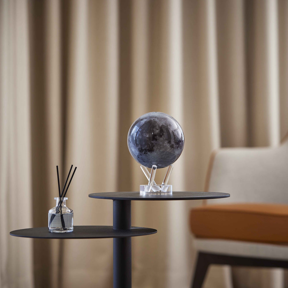Moon MOVA Globe displayed on modern side table living room decor
