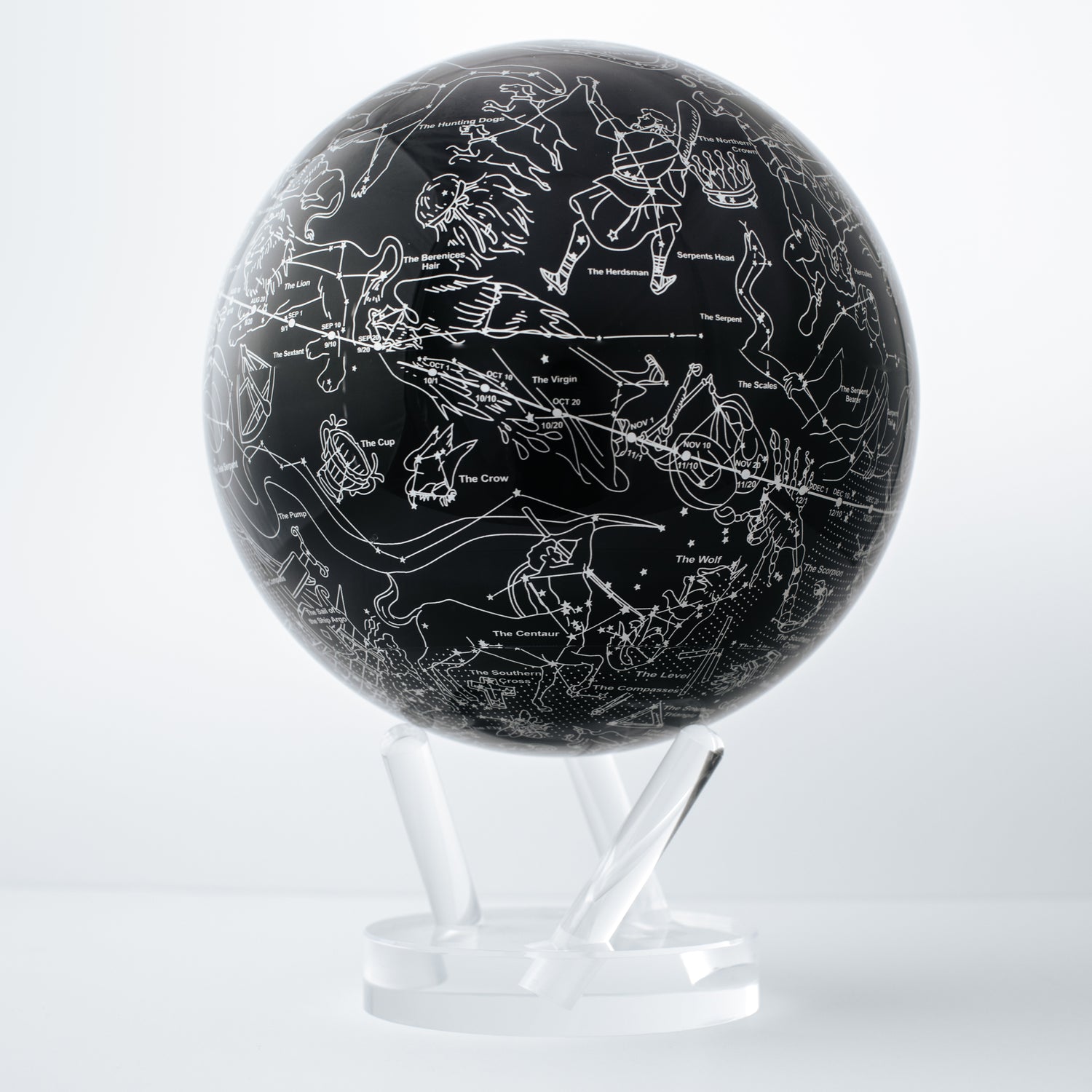 CONSTELLATIONS MOVA Globe close-up with silver star patterns, rotating sphere powered by ambient light and hidden magnets.