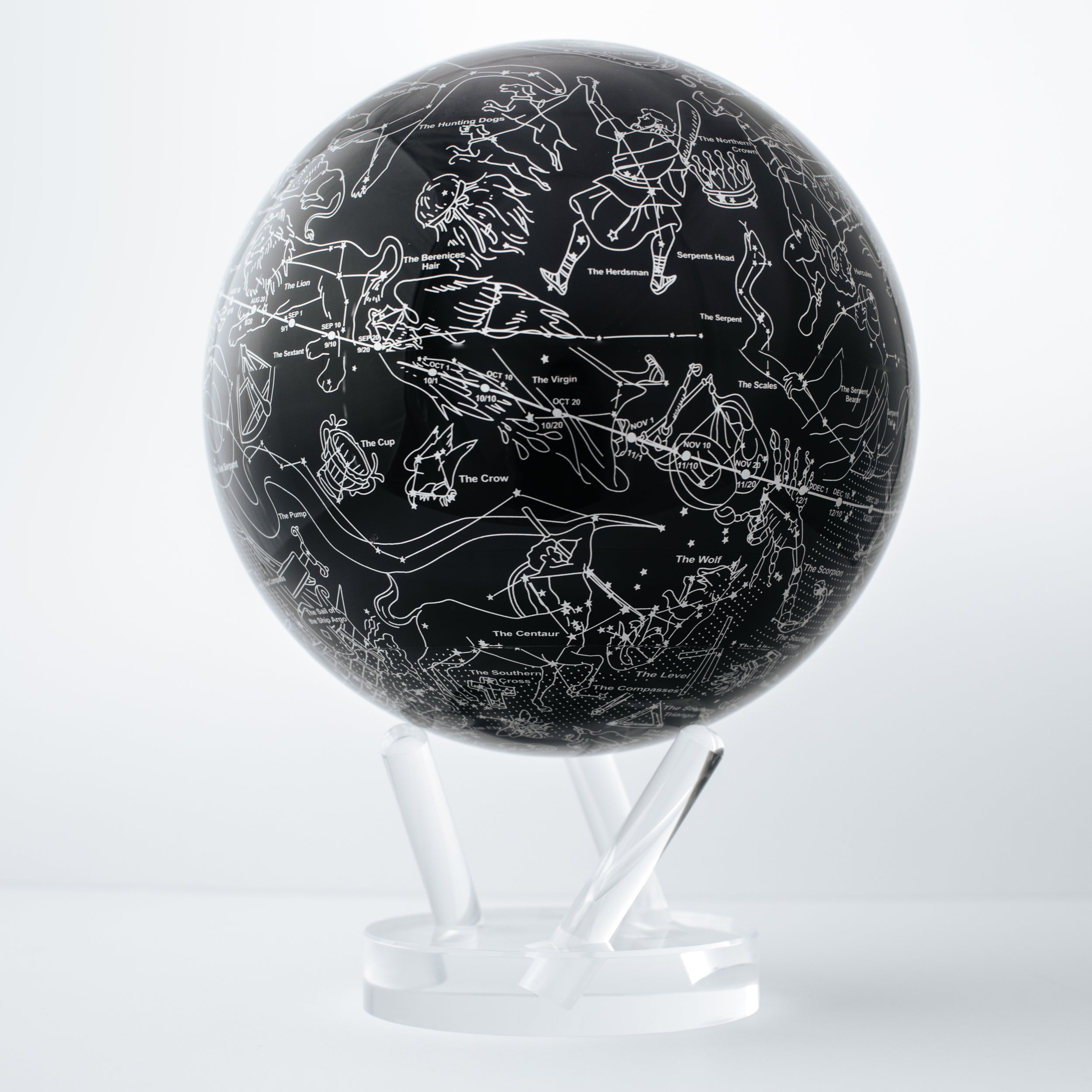 CONSTELLATIONS MOVA Globe close-up with silver star patterns, rotating sphere powered by ambient light and hidden magnets.